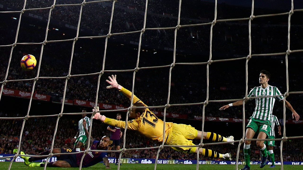 Betis deals Barcelona 1st home league loss in 2 years
